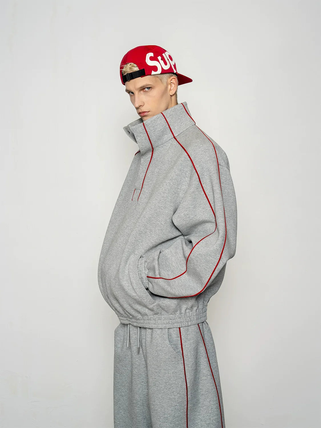niche deconstruction contrasting color air layer turtleneck sweater men's scimitar casual pants sports suit FE0602