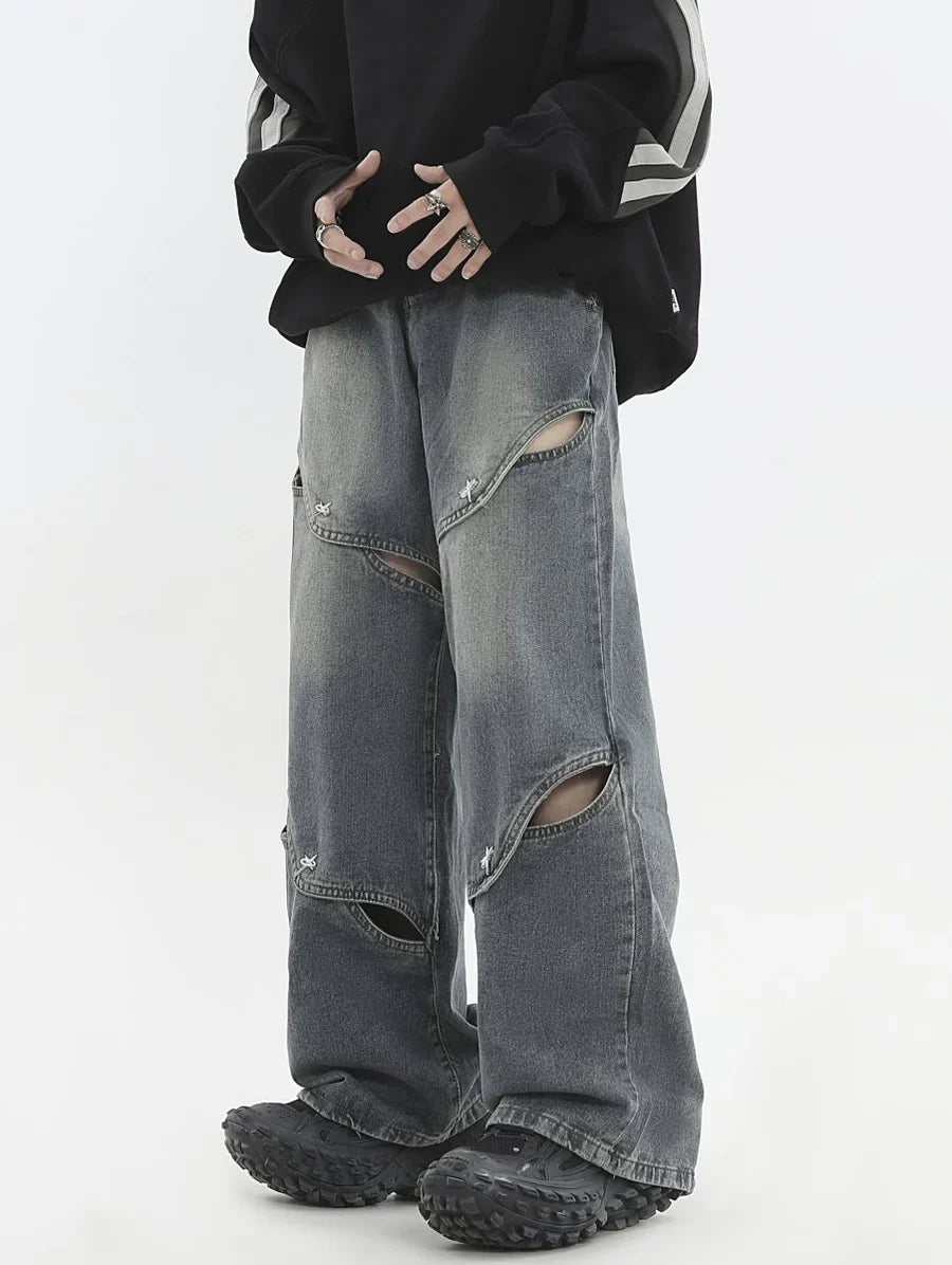 METAL HOLE BREAKING JEANS   FE0399