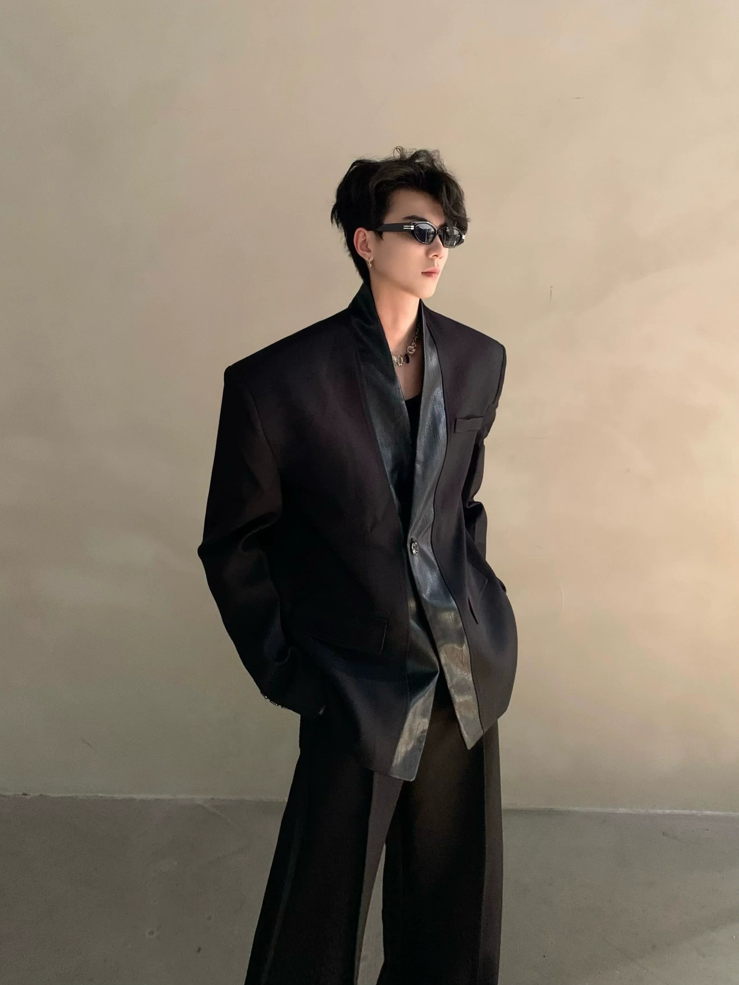 Autumn and winter black collarless suit splicing leather jacket profile shoulder pads light luxury ruffian handsome high-end jacket FE0584