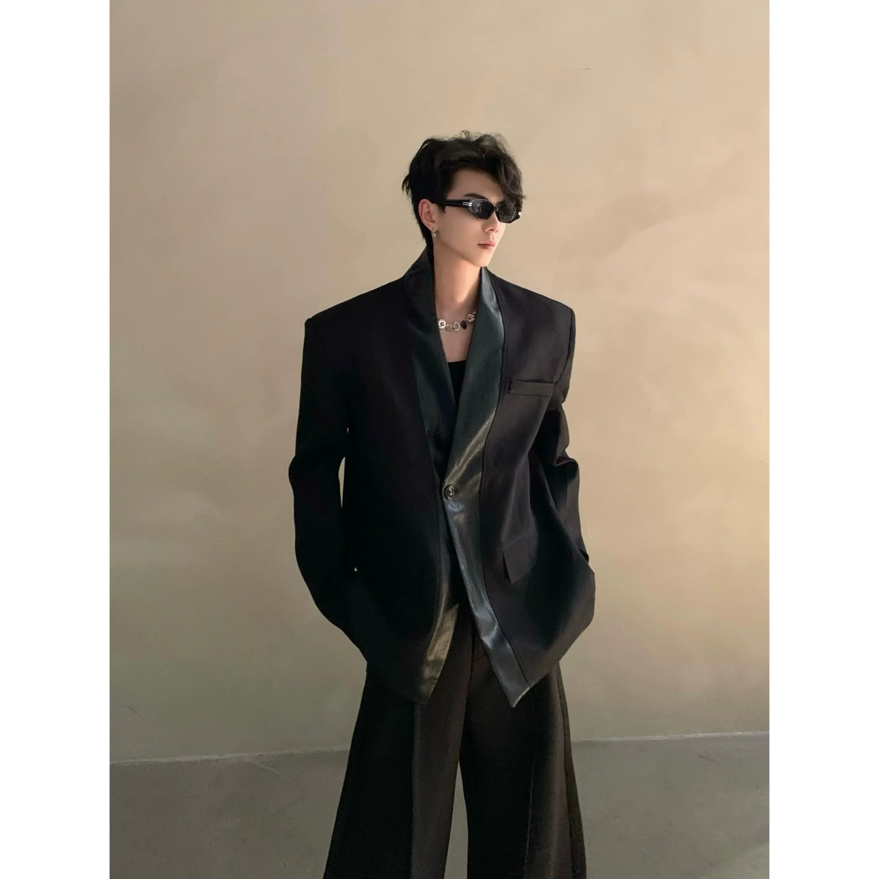 Autumn and winter black collarless suit splicing leather jacket profile shoulder pads light luxury ruffian handsome high-end jacket FE0584