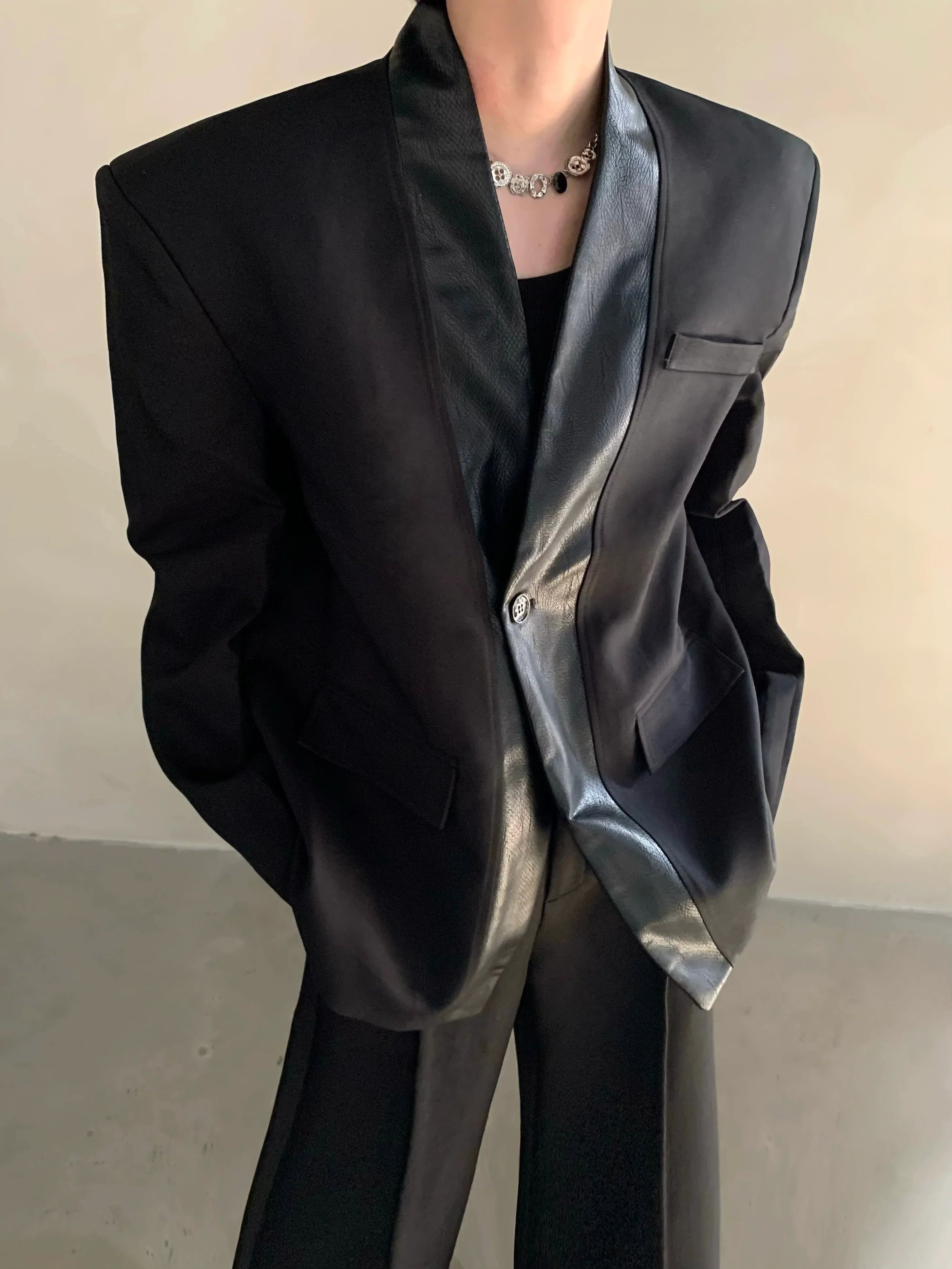 Autumn and winter black collarless suit splicing leather jacket profile shoulder pads light luxury ruffian handsome high-end jacket FE0584