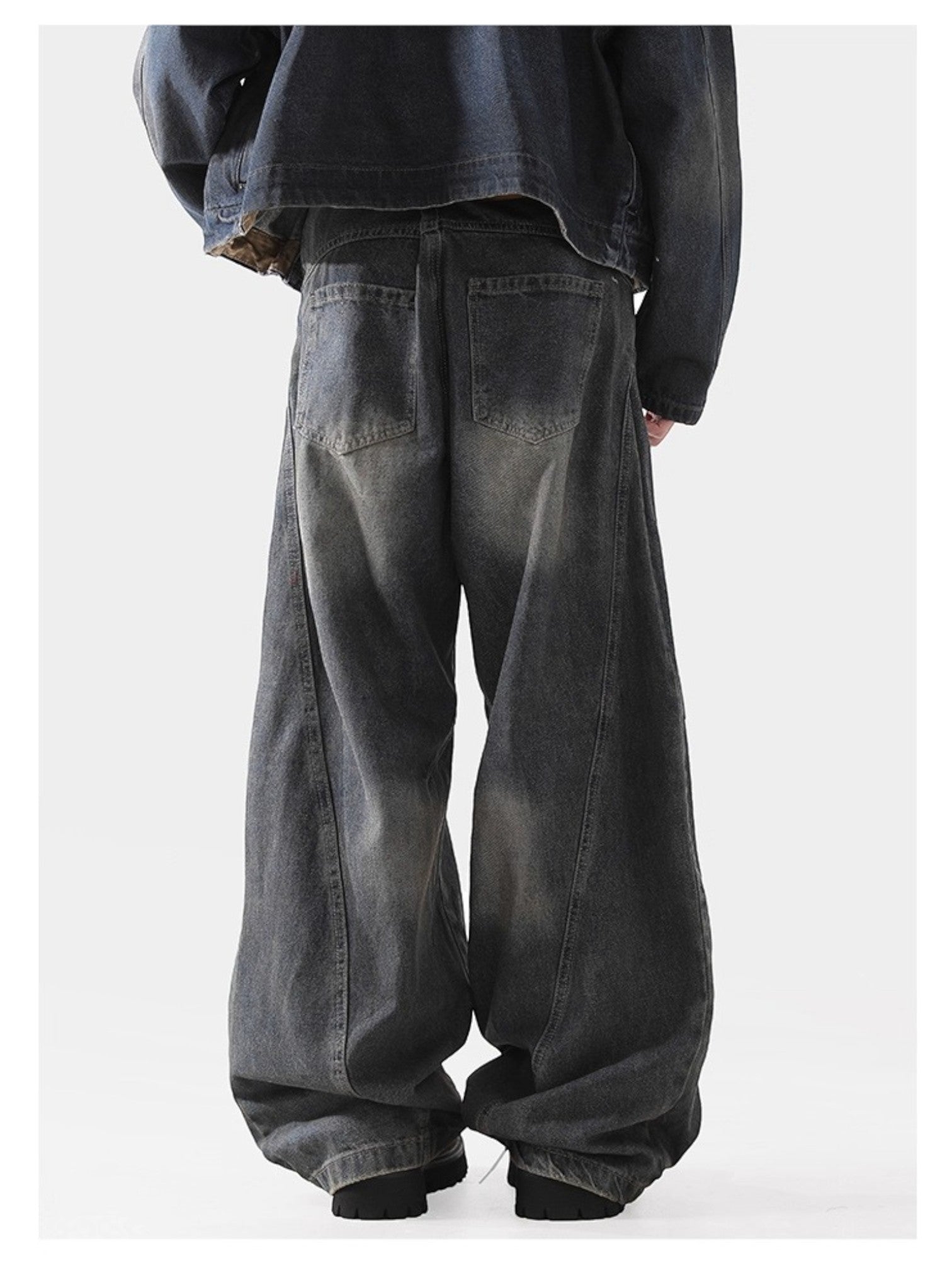 DECONSTRUCTED SABER-CUT JEANS  FE0504